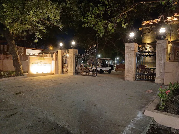 Approach gate and driveway at night
