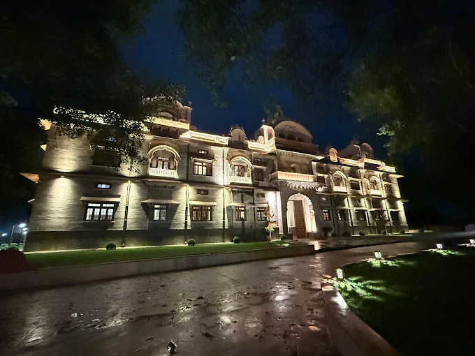 Illuminated heritage hotel in Ujjain at night