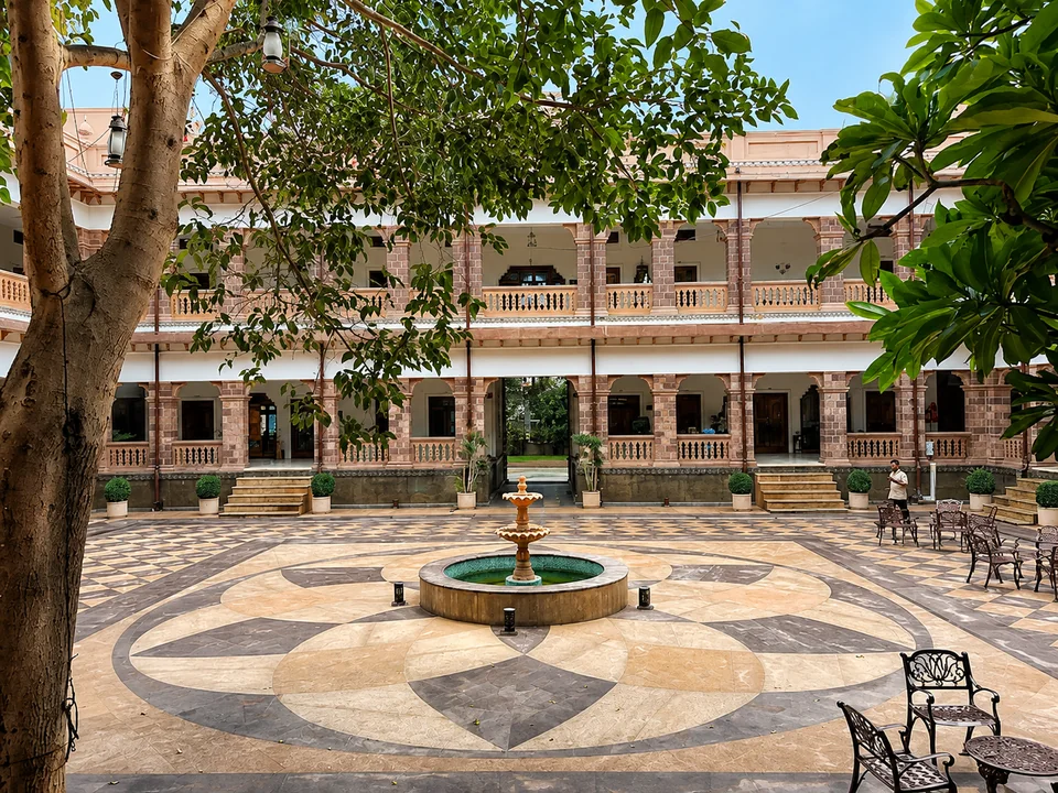 Courtyard with mature tree and central fountain
