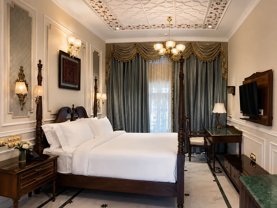 Elegant room with refined drapery and ceiling detail